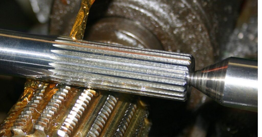CNC spline shaft milling machine hobbing a steel shaft for an automotive transmission