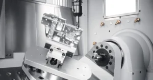 5-axis machining services cutting a complex freeform impeller surface on a multi-axis CNC machine
