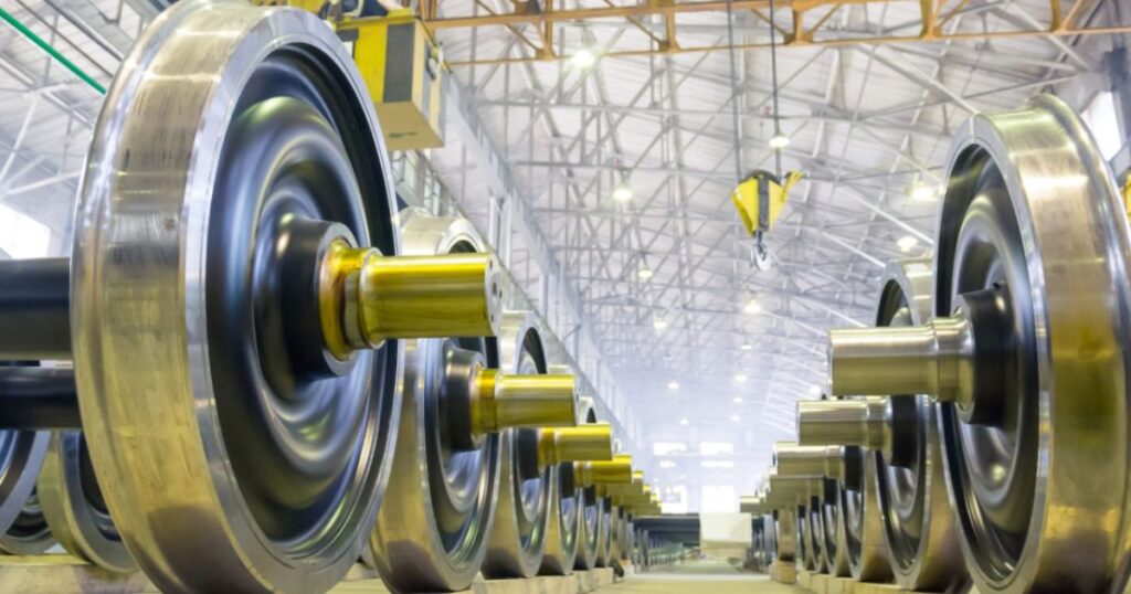 Turnkey train wheel manufacturing line with forging, machining, inspection, and wheelset assembly modules