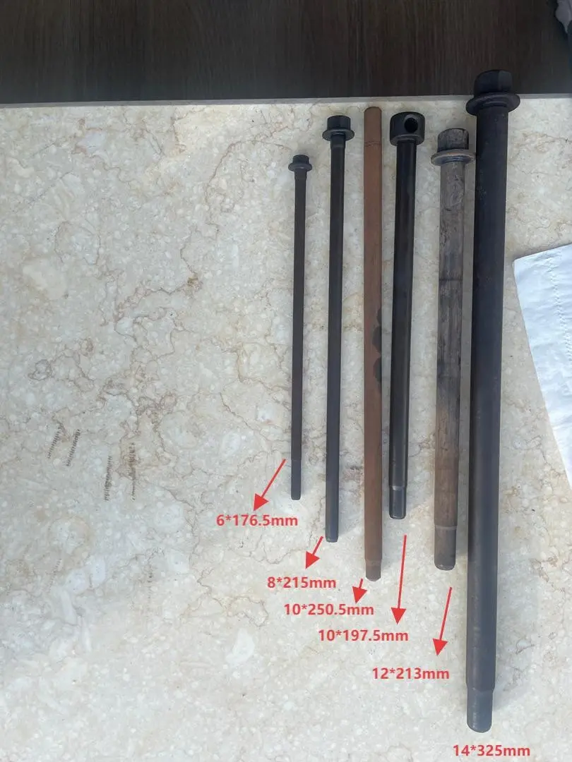 Automatic Straightening Machine: How the Automation Works 3 Hardened bolt samples marked with diameters and lengths spanning both straightening machine classes