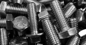Solutions 7 Steel bolts and fasteners representing the hardened parts an automatic straightening machine processes