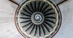 Glass lubricant forging context: an aero-engine fan face whose blades start life as hot-forged preforms