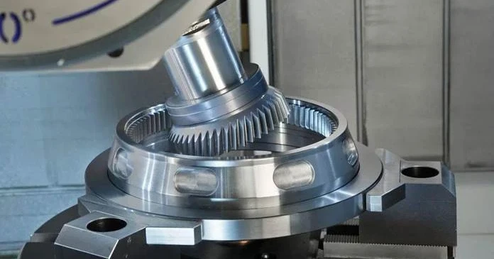 Power Skiving Process: Axis Cross Angle Gear Cutting 5 Internal ring gear mounted in a machine fixture during a power skiving process crossed-axis cutting pass