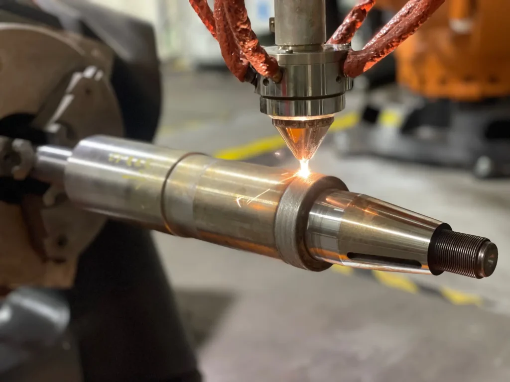 Laser Cladding: A Controlled Shaft-Surface Workflow 3 Laser cladding showing controlled restoration of a metal shaft surface