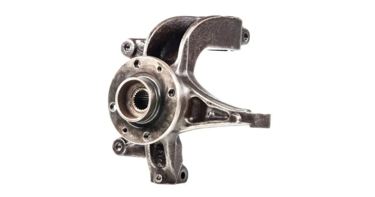 Machined automotive steering knuckle representing the steering knuckle machining process