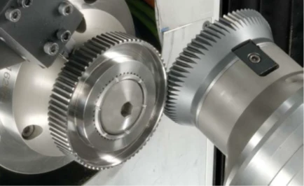 Power Skiving Process: Axis Cross Angle Gear Cutting 4 Power skiving cutter with matching tooth form meshed against an external gear workpiece during crossed-axis gear cutting