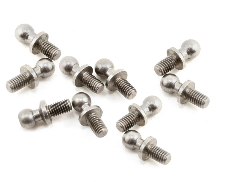 Threaded ball stud components on a white background for a guide to straighten long ball studs